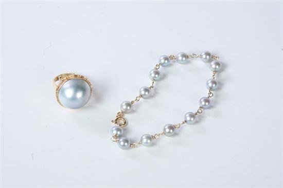 Appraisal: LADY'S PEARL RING AND BRACELET Pictured is a KT yellow