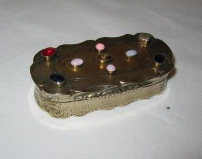 Appraisal: A VICTORIAN GILDED SNUFF BOX of rounded oblong form with