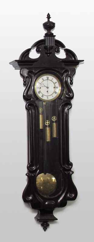 Appraisal: SERPENTINE TRIPLE WEIGHT VIENNA REGULATOR WALL CLOCK Architectural carved pediment