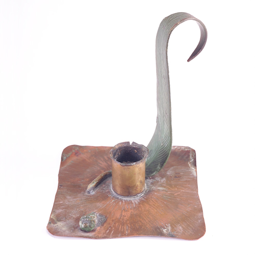 Appraisal: JAUCHEN'S Hammered copper chamberstick with square base and tall eucalyptus