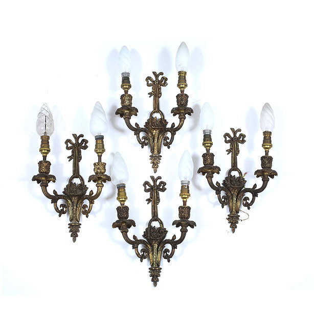 Appraisal: A SET OF FOUR TWIN BRANCH GILT METAL WALL LIGHTS