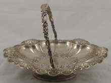 Appraisal: A hallmarked silver swing handle basket with chased and embossed