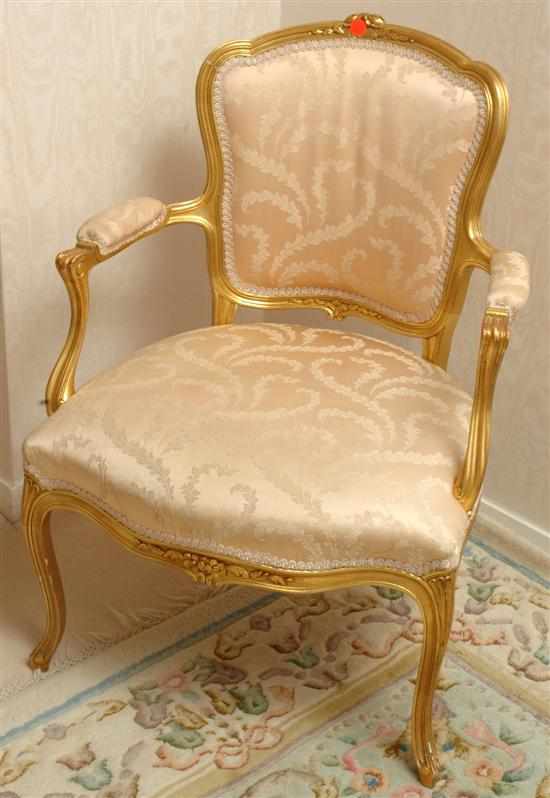 Appraisal: A Louis XV style gilt wood bergere th century The