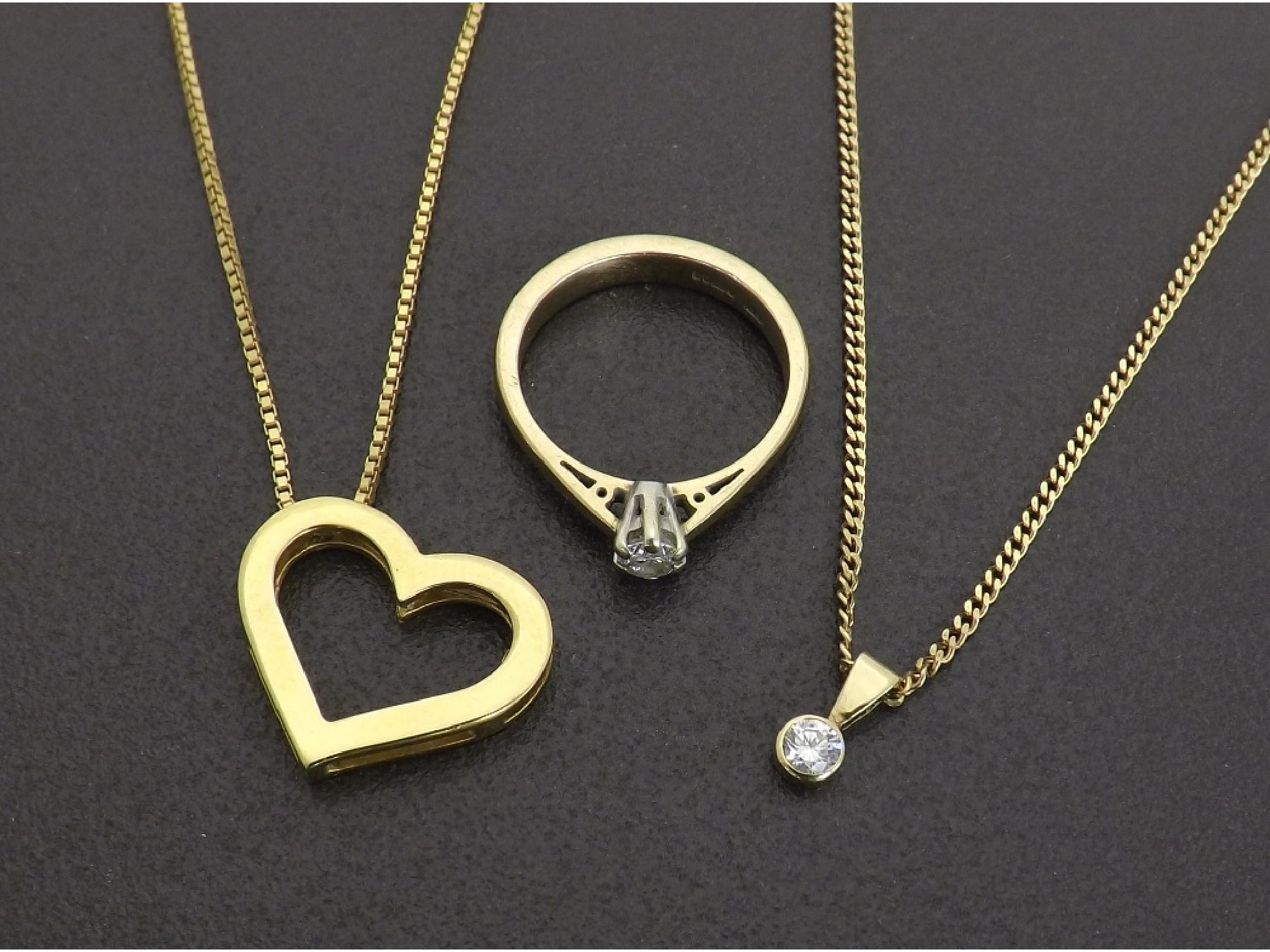 Appraisal: ct yellow gold heart pendant ct diamond set pendant on