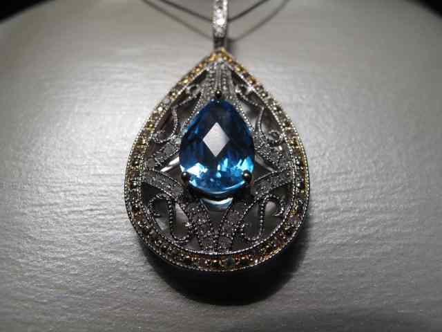 Appraisal: A kt white gold diamond and blue topaz necklace Total