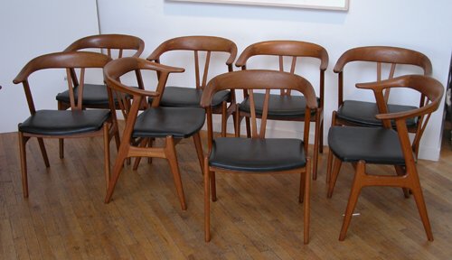 Appraisal: Eight Teak Dining Armchairs circa teak and leather on Wood