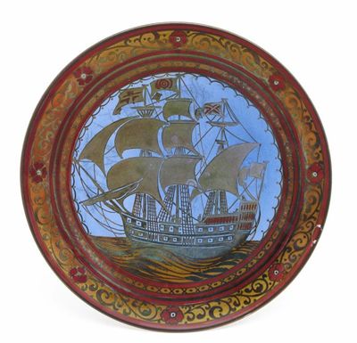 Appraisal: A Pilkington's Lancastrian wall plate by William S Mycock painted