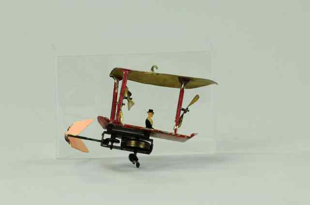 Appraisal: PUSHER PLANE Early hand painted example able to suspend by