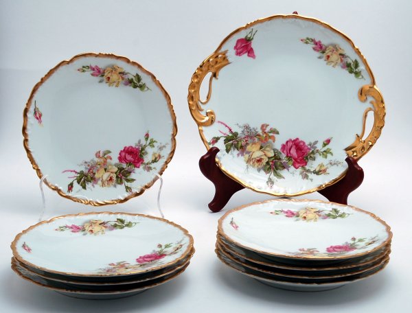 Appraisal: Limoges dessert set of eight plates and handled tray rose