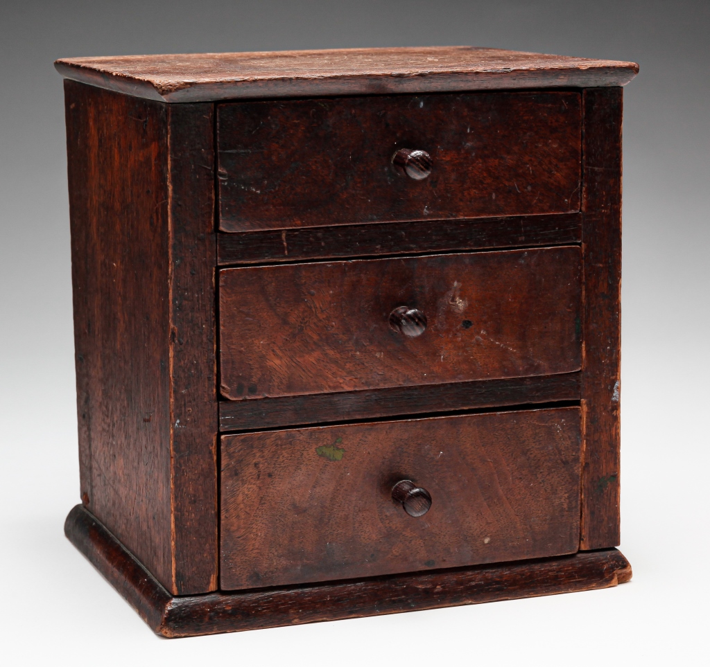 Appraisal: AMERICAN TABLE TOP SET OF DRAWERS Mid th century walnut