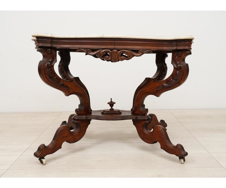 Appraisal: Victorian walnut parlor table with marble turtle shaped top h