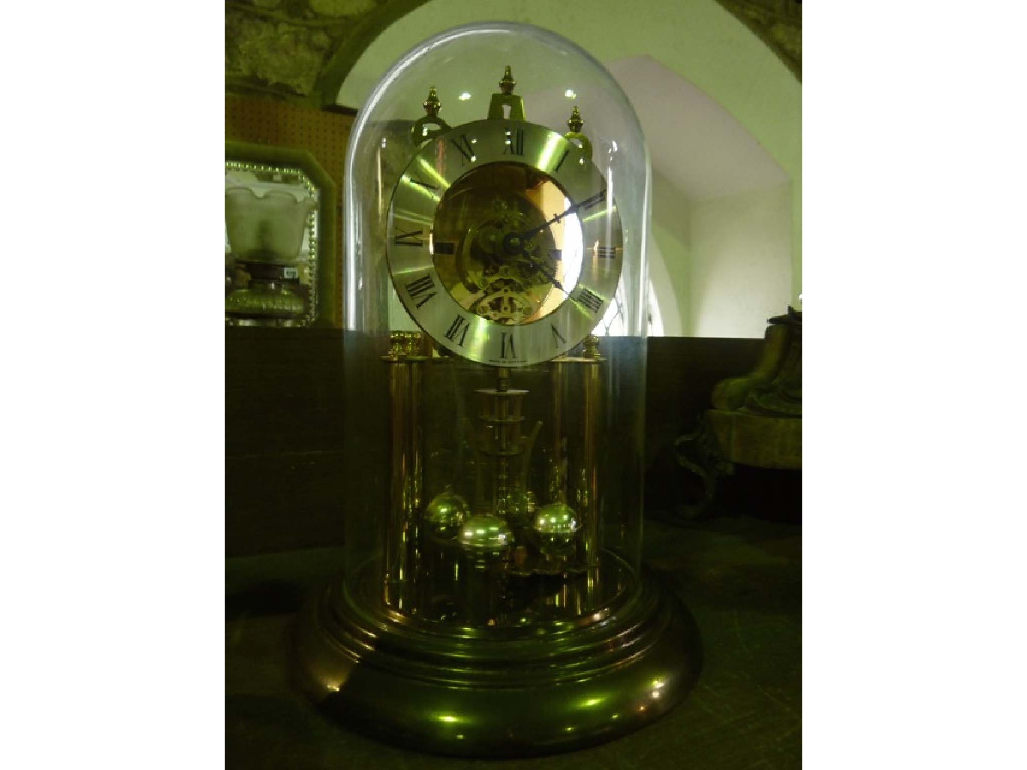 Appraisal: A German day or anniversary clock in brass with silvered