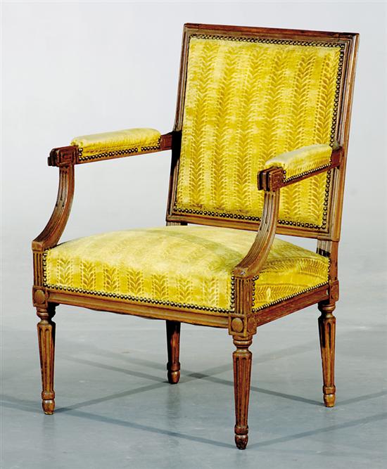 Appraisal: Louis XVI carved fruitwood fauteuil late th early th century