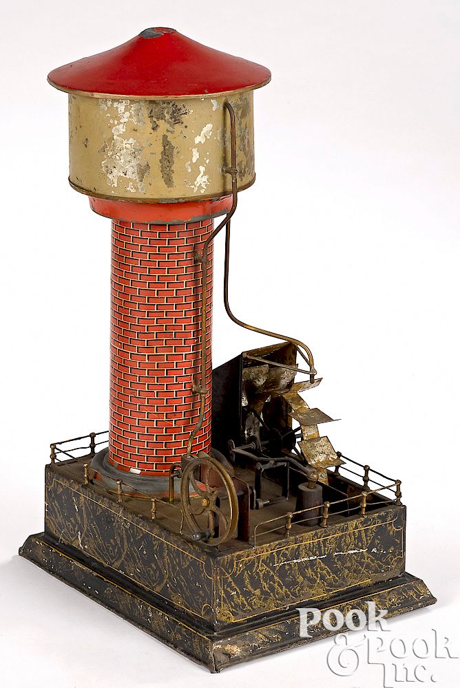 Appraisal: Carette lithographed tin water tower steam toy accessory Carette painted