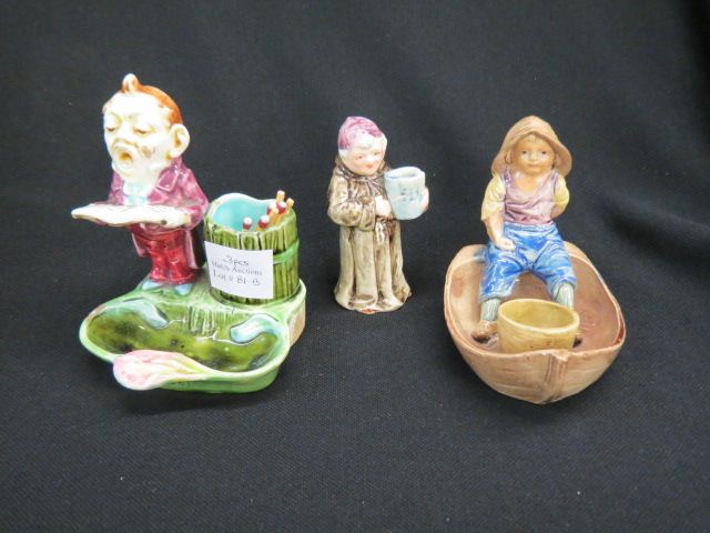 Appraisal: pcs Majolica Pottery with Figures boy in boat monk with