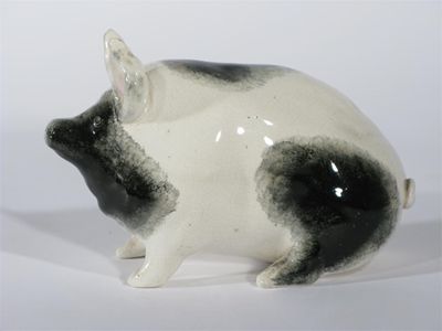 Appraisal: A Wemyss pottery pig painted in shades of black and