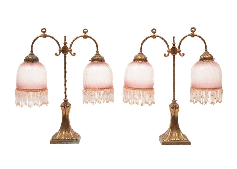 Appraisal: Pair of Brass and Rose Glass Two-Light Lamps beaded fringe