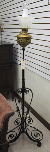 Appraisal: LATE VICTORIAN KEROSENE FLOOR LAMP the brass lamp fitted with