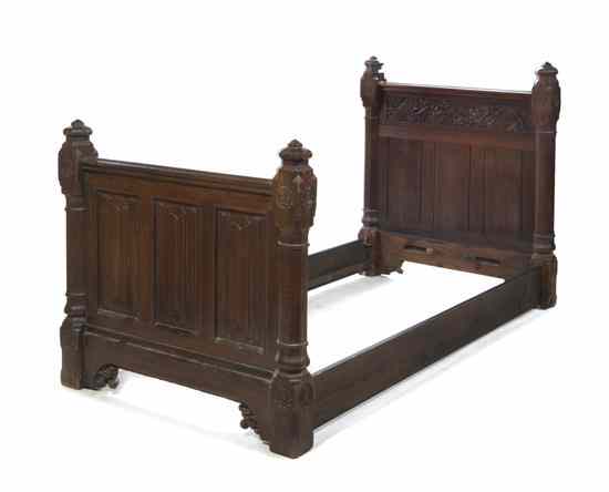 Appraisal: A English Oak Single Bed the footboard carved with linenfold