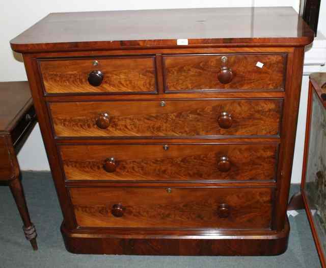 Appraisal: A VICTORIAN MAHOGANY CHEST of three long two short drawers