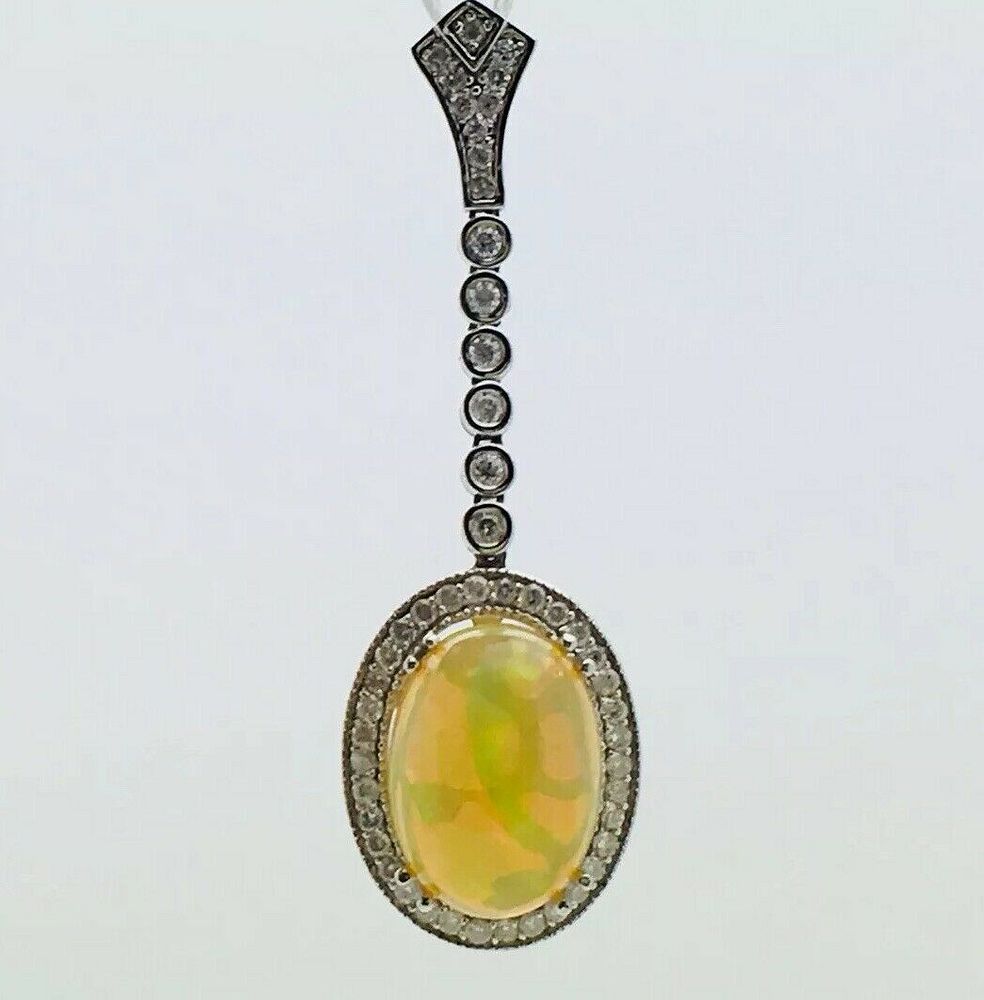 Appraisal: k White Gold With Australian Opal Diamond Pendant k White