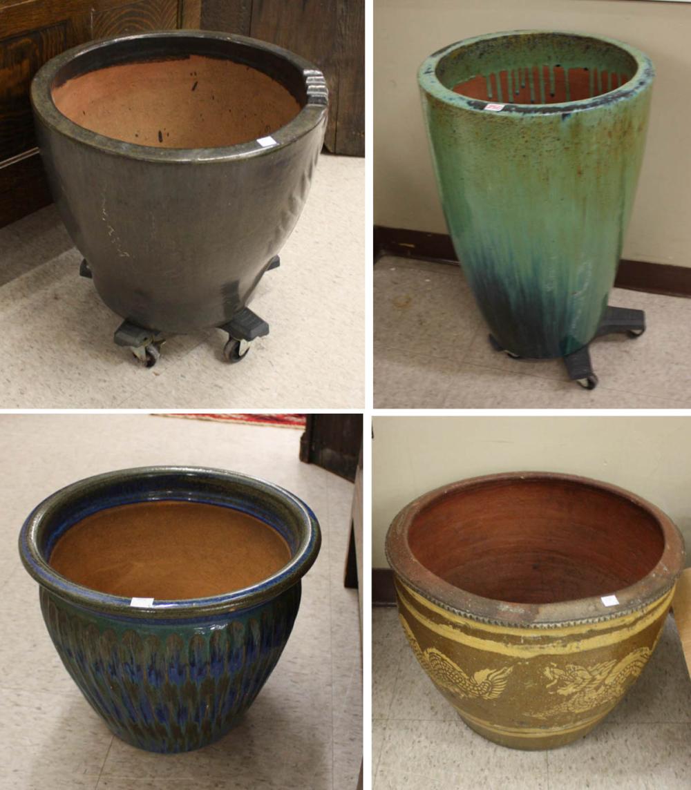 Appraisal: FOUR GLAZED POTTERY PLANTERS H x D blue green glaze