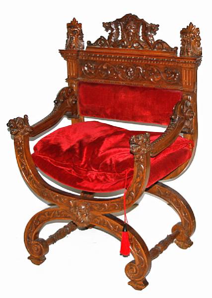 Appraisal: A Baroque style upholstered walnut Savonarola chair