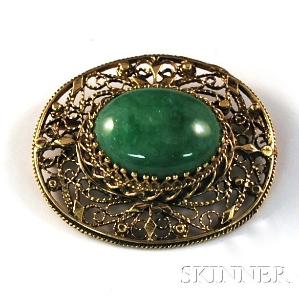 Appraisal: kt Gold Filigree-mounted Jade Brooch with oval cabochon jade measuring