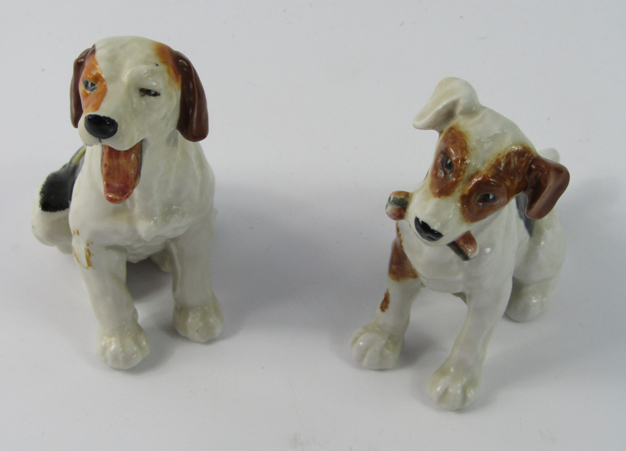 Appraisal: Two Royal Doulton figures of terriers one modelled yawning the