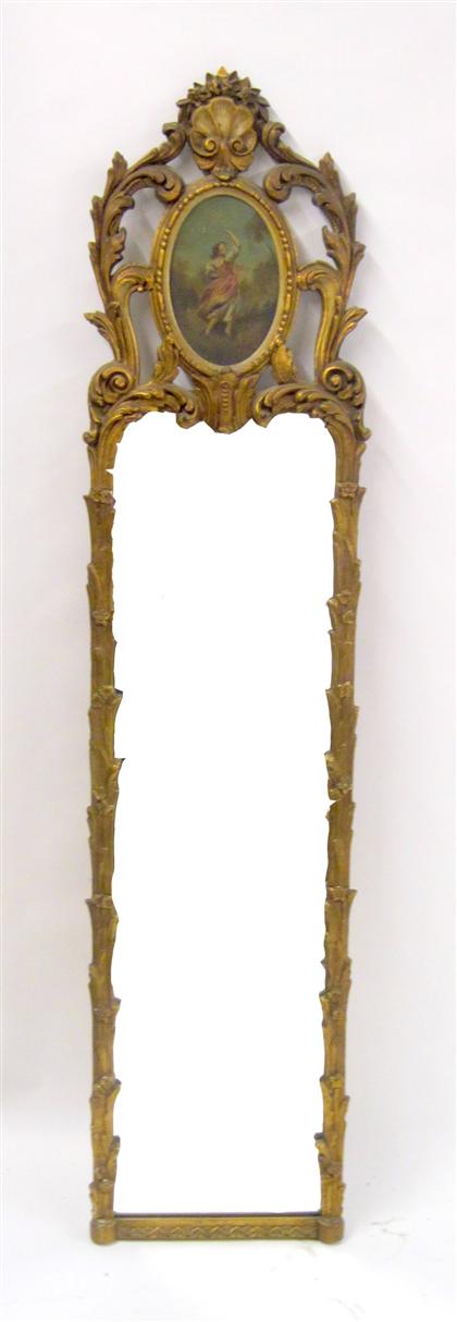 Appraisal: Continental giltwood trumeau mirrorWith an upright rectangular mirror p late