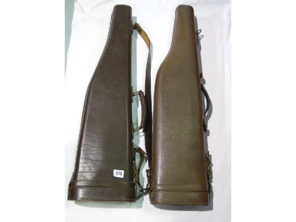 Appraisal: Two brown leather 'leg of mutton' gun cases