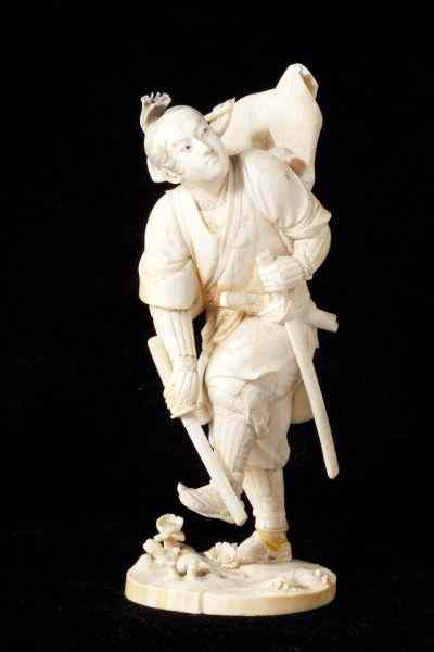 Appraisal: Japanese Ivory Carving of a Samuraidepicted in action with weapon