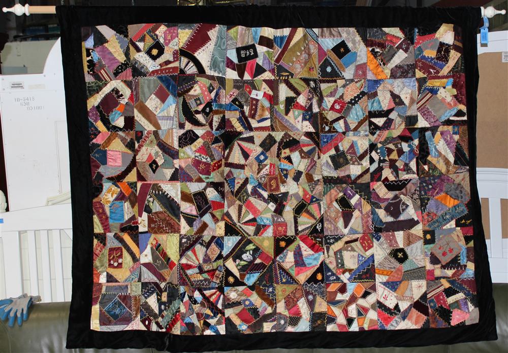 Appraisal: ANTIQUE CRAZY QUILT with silk satin velvet and additional fabrics