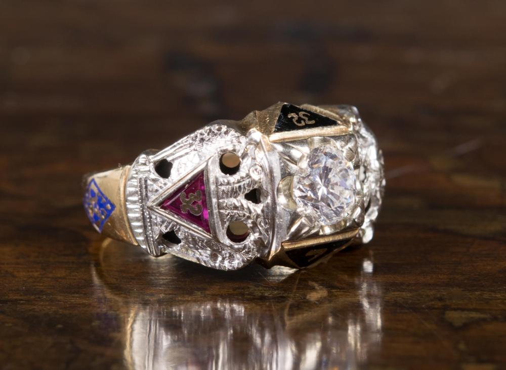 Appraisal: MAN'S DIAMOND AND FOURTEEN KARAT GOLD MASONIC RING The k