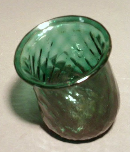 Appraisal: Dark green glass Christmas light th c h x diam