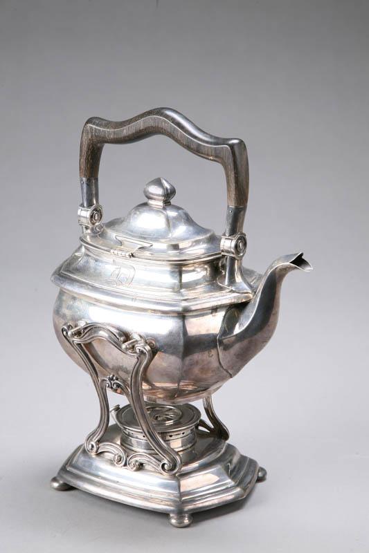 Appraisal: STERLING SILVER TEAPOT ON STAND With a wooden handle Marked