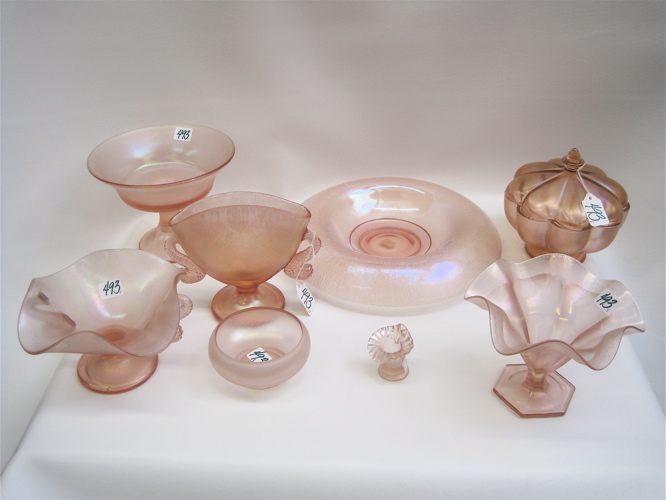 Appraisal: EIGHT PIECES OF VELVA ROSE PINK STRETCH GLASS bowls to