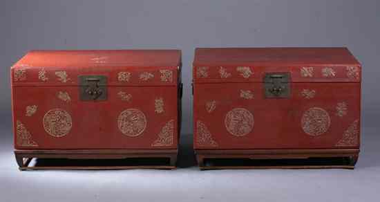 Appraisal: PAIR CHINESE RED LACQUERED PIG SKIN TRUNKS AND WOOD STANDS