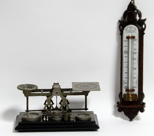 Appraisal: A letter scale with rectangular amboyna base and a mercury