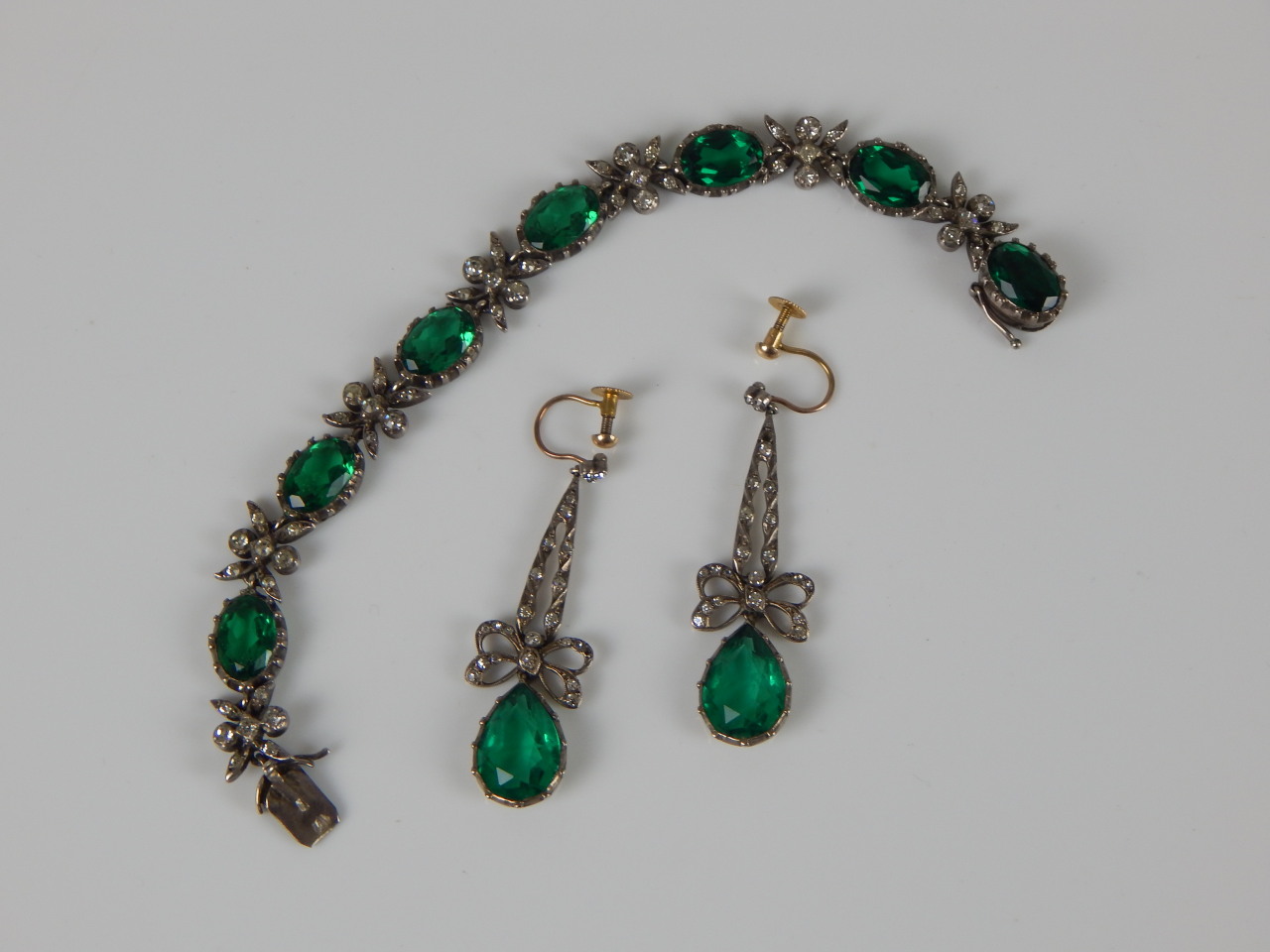 Appraisal: An earring and bracelet set in the Victorian style with