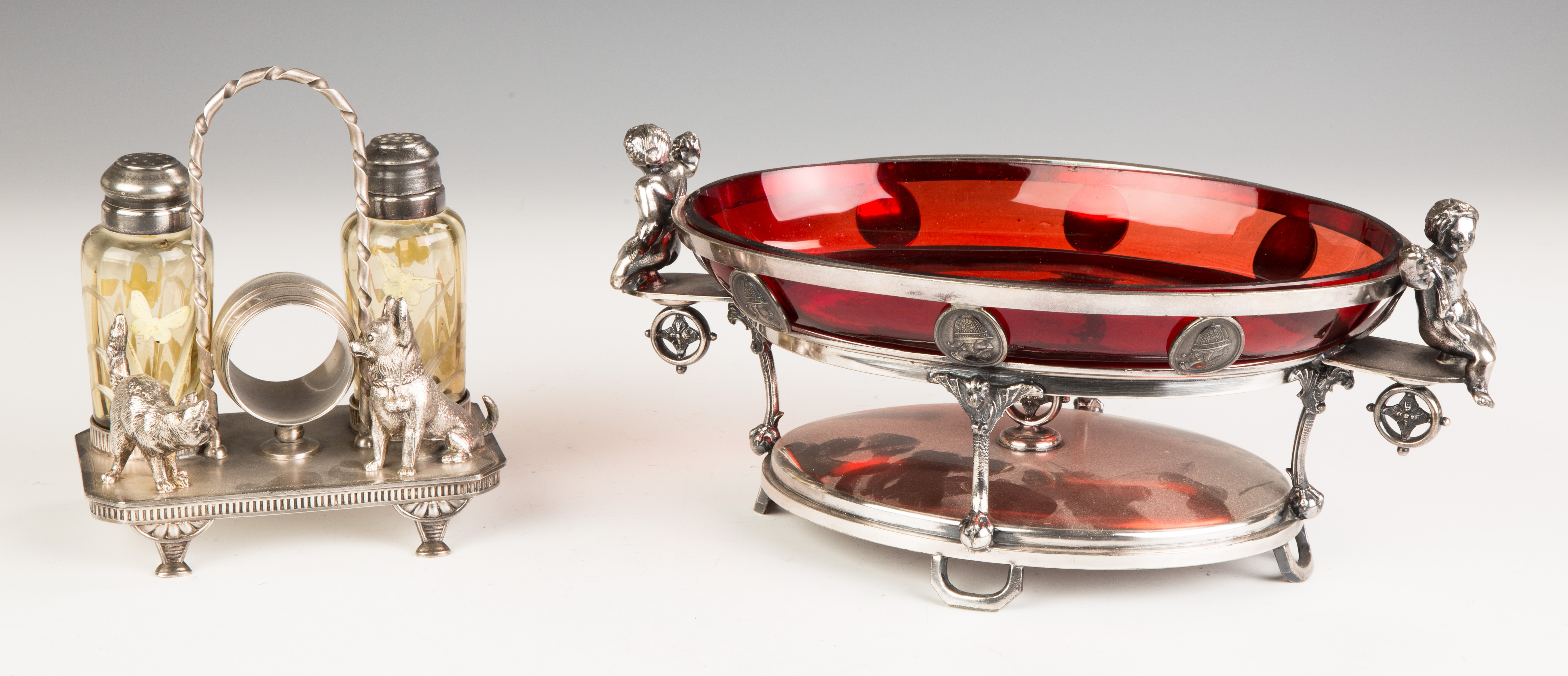 Appraisal: Reed Barton Silver Plate Centerpiece with Cranberry Glass Insert Soldier