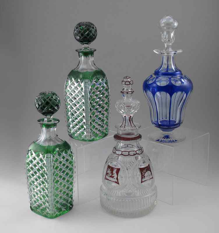 Appraisal: FINE CUT TO CLEAR GLASS DECANTERS A matched pair of