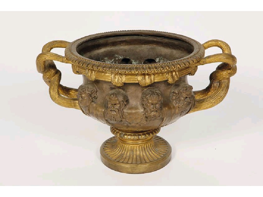 Appraisal: AFTER THE ANTIQUE A BRONZE AND GILT-BRONZE WARWICK VASE of