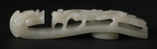 Appraisal: Chinese caved white jade dragon and qilin belt hook Chinese