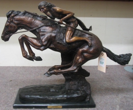 Appraisal: WESTERN BRONZE SCULPTURE Cheyenne after the works of Frederic Sackrider