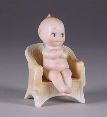 Appraisal: KEWPIE GOVERNOR This German Kewpie with his arms folded and