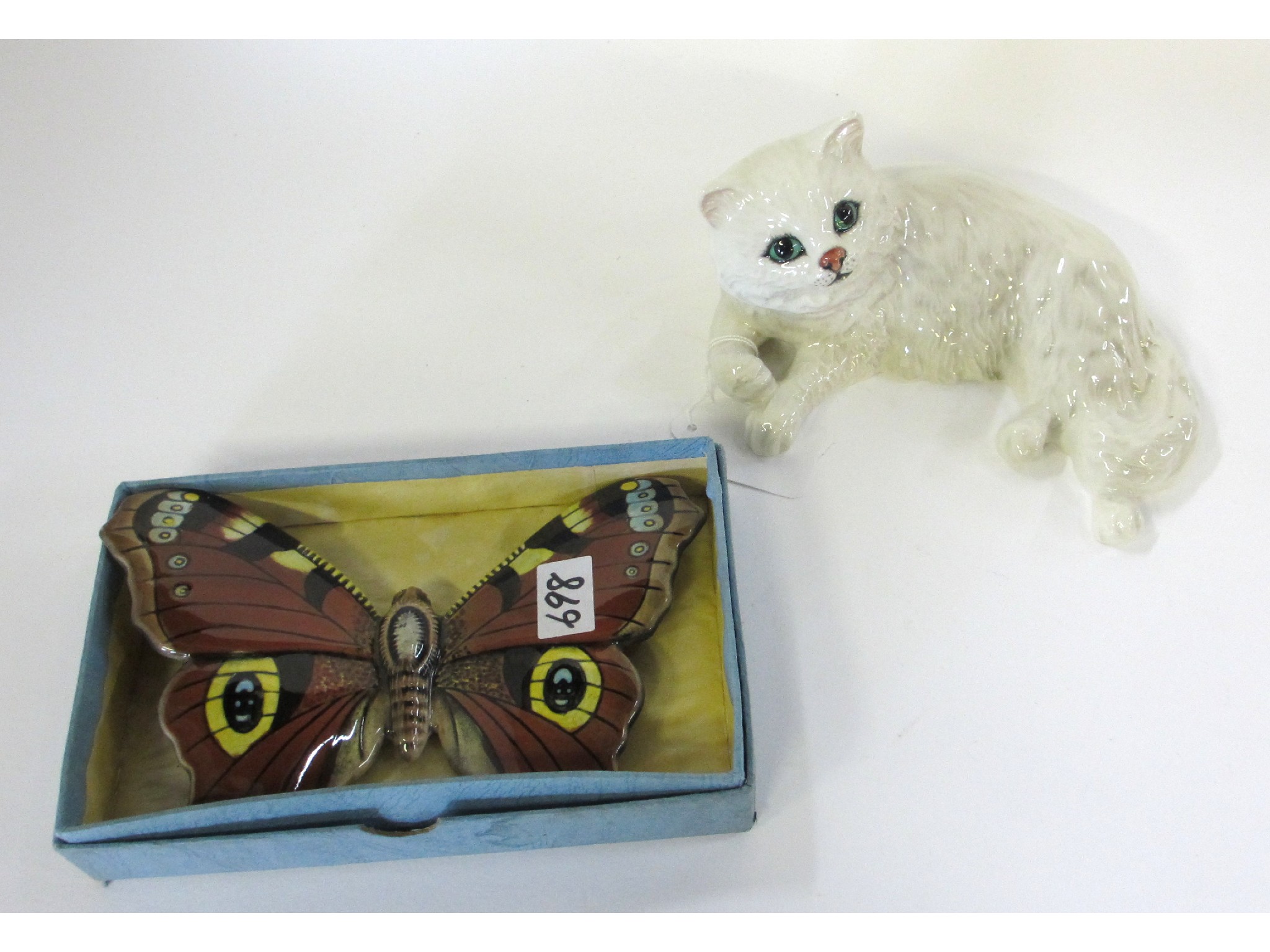 Appraisal: Beswick Peacock butterfly no and a Beswick cat no