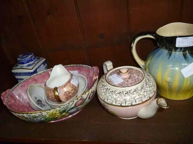 Appraisal: A MALING WARE PINK LUSTRE AND FLOWER DECORATED OVAL BOWL