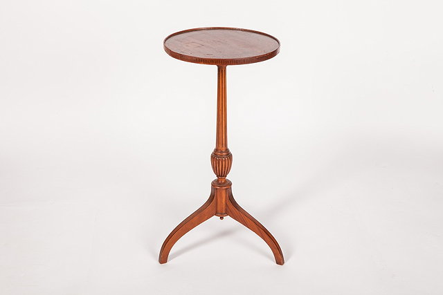 Appraisal: A SATINWOOD WINE TABLE with painted leaf border on fluted