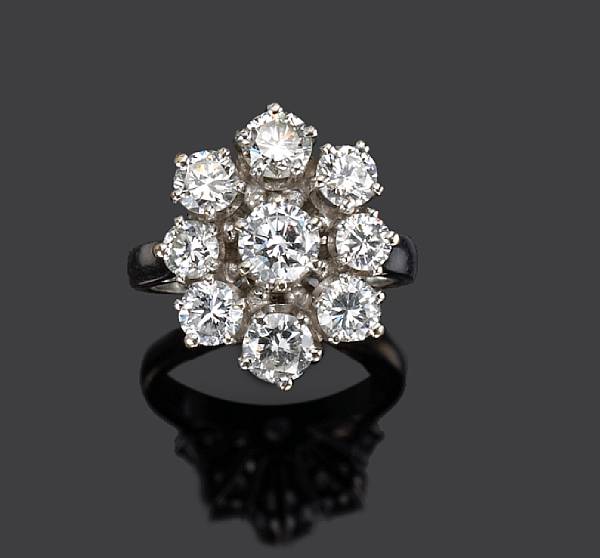 Appraisal: A diamond floret ring French with French assay mark estimated